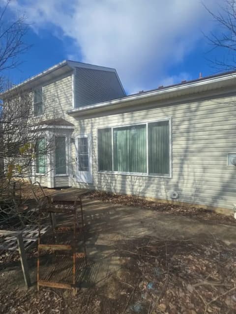 Rear of house with vinyl siding